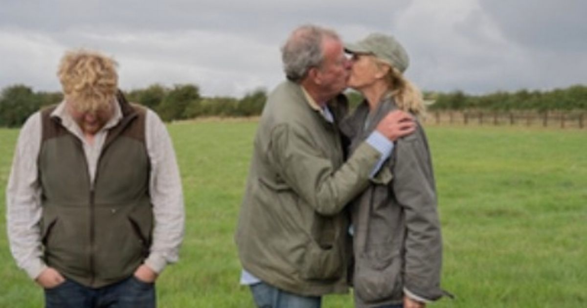 Jeremy Clarkson shares a smooch with girlfriend Lisa Hogan as he films at Diddly Squat