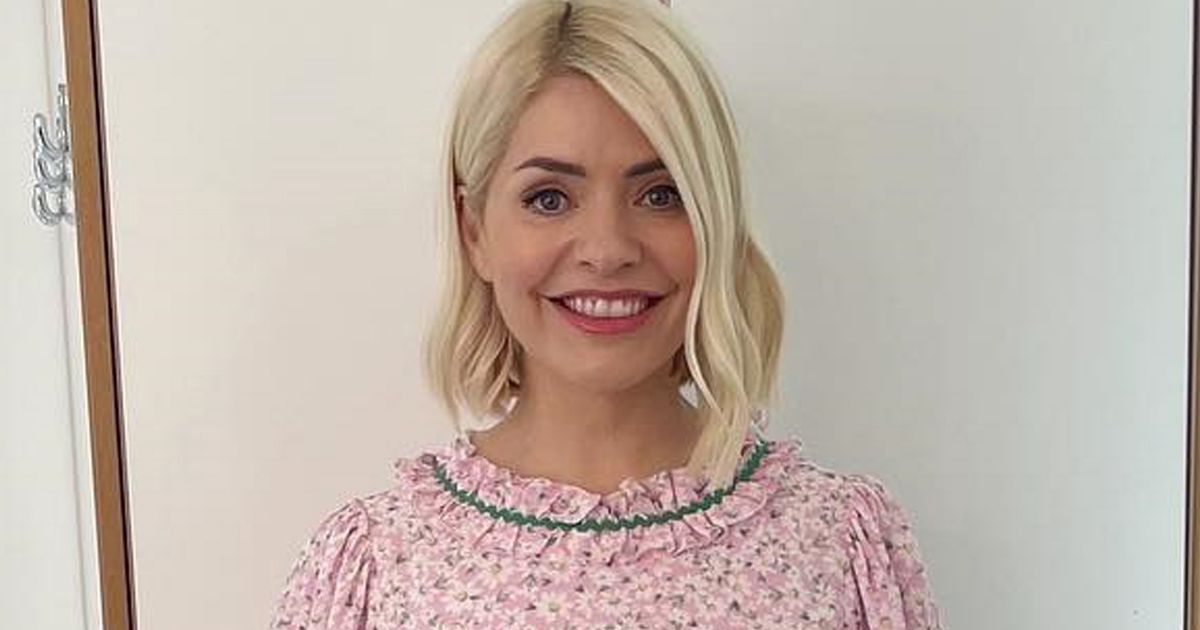 Holly Willoughby looks pretty in pink as she returns to This Morning after Covid