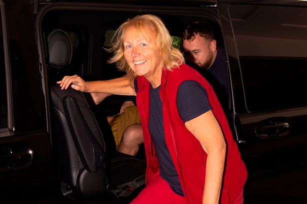 Sue Cleaver is all smiles as she arrives at plush hotel after I'm A Celebrity exit